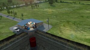 A computer-generated image of a gravity energy storage facility in a former mining facility, showing a cutaway of a vertical mine shaft, and a cutaway of a small building with machinery inside.